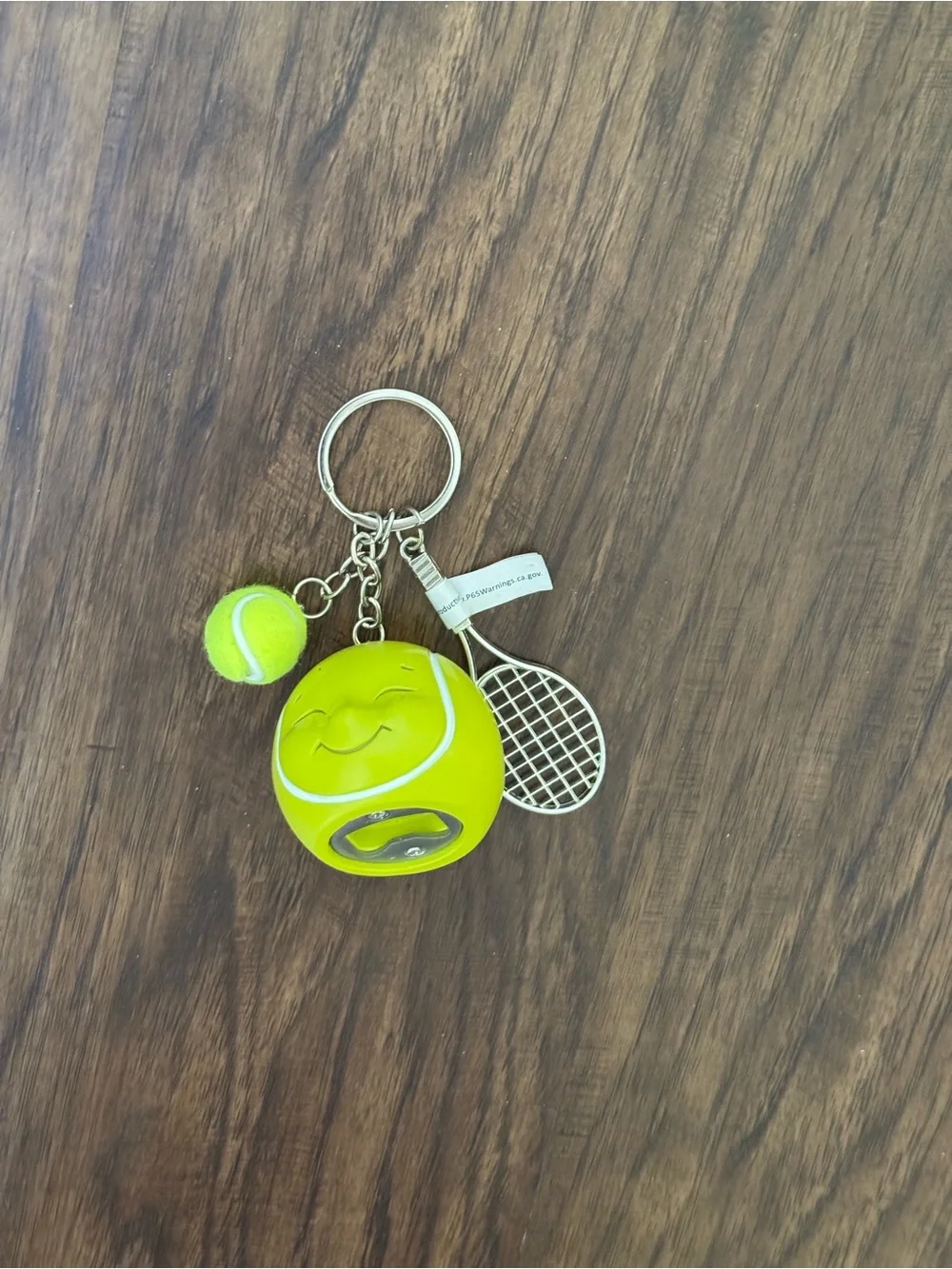 Urban outfitters Tennis Ball & Racket Keychain - Neon Yellow